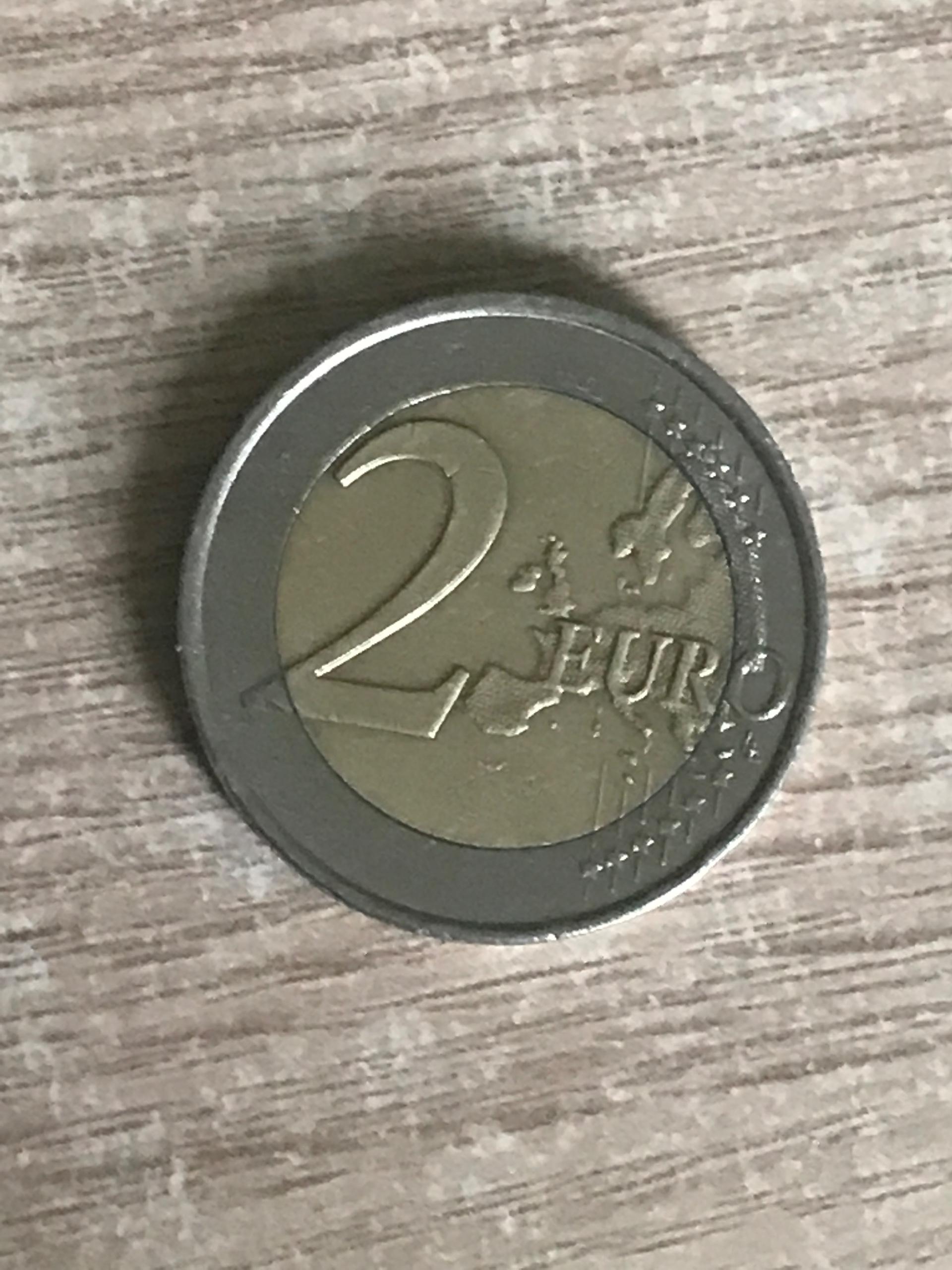 Reta moneta su žmogeliuku
