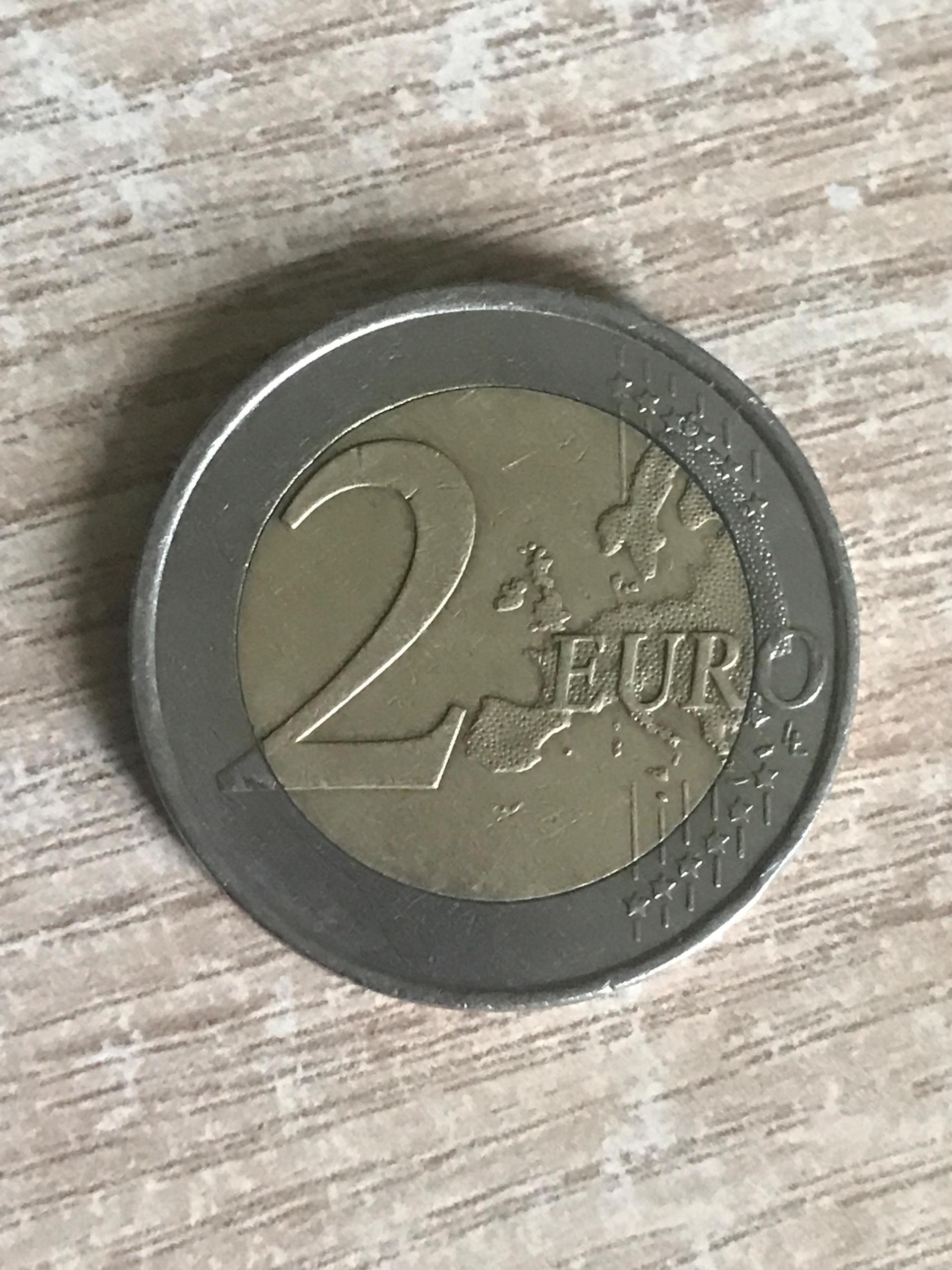 Reta moneta su žmogeliuku