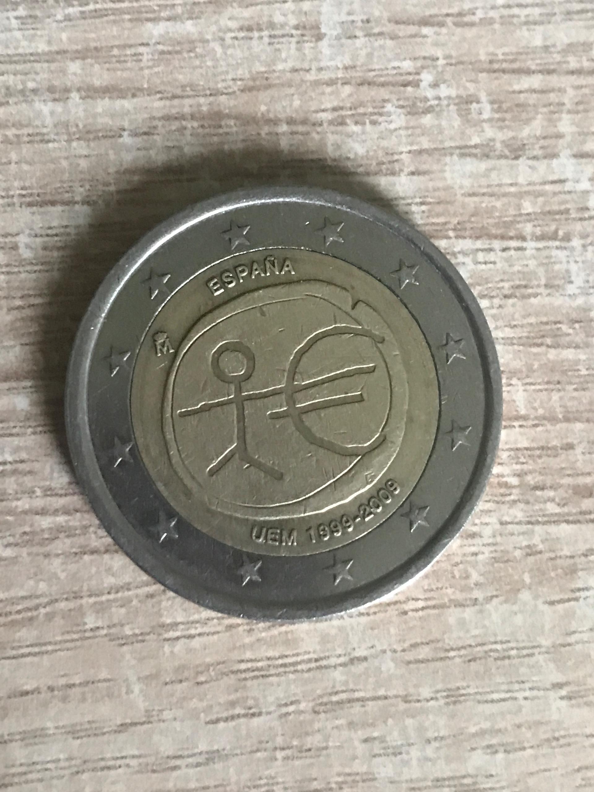 Moneta su žmogeliuku 